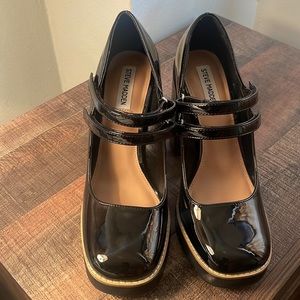 Twice black patent Steve Madden heels.